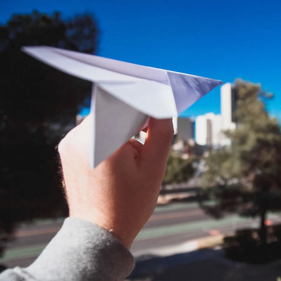paper aeroplane flying